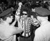 Abbie-Hoffman-arrested-in-flag-shirt.jpg