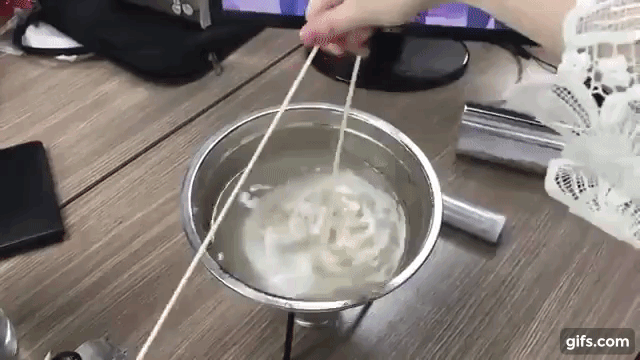 Creative Employee Makes a Homemade Bean Sauce Dish at Her Desk With One  Giant Noodle