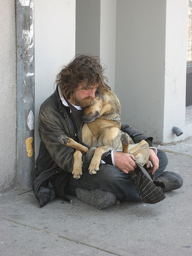 homeless_man_cuddling_dog_0_1.jpg